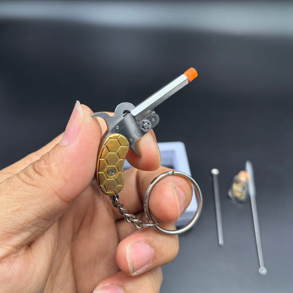 Mini 2mm Stainless Steel Pinfire Gun Keychain – Gold Football Handle